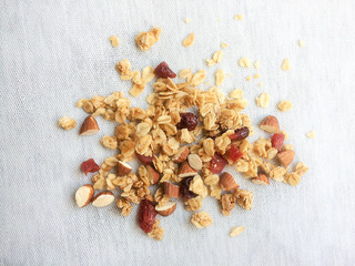 close up Top view muesli, granola healthy meal on fabric background
