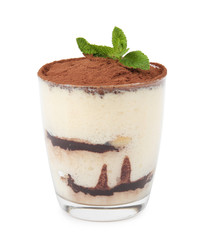 Delicious tiramisu cake in glass with mint isolated on white
