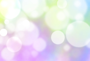 Colorful magic glitter glow festive abstract background.