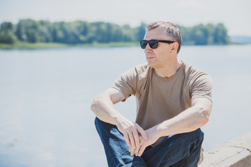 Mature European man with a sad philosophical mood. The concept of life after 50 years, problems and...