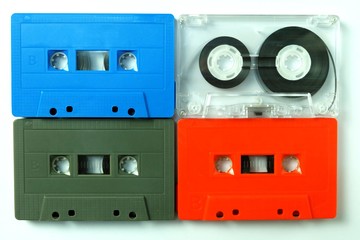 Collection of colorful old audio cassette tape isolated on a white background