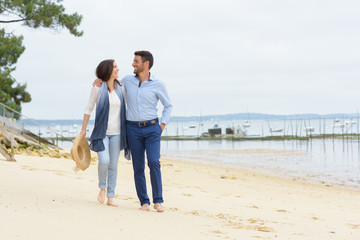 portrait of a happy smiling couple at the beach