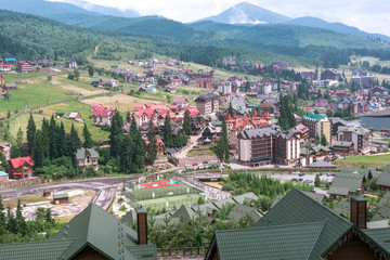 Village in the Mountains. Carpatian village with hotels and  sports ground in the  Mountains