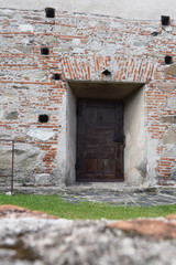 old door in stone wall