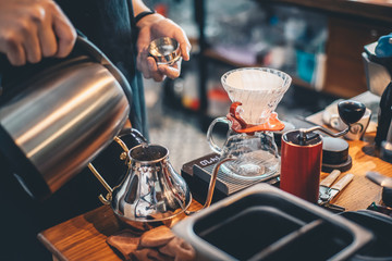 Barista making drip coffee in coffee shop, barista cafe making coffee, coffee maker