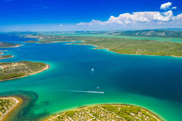 Fototapeta na wymiar Beautiful Croatian coast, emerald and turquoise blue sea, Murter islands archipelago from air, Dalmatia, Croatia