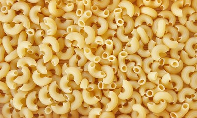 Background Textured of Uncooked or Dried Elbow Macaroni
