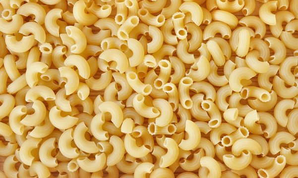 Background Textured of Uncooked or Dried Elbow Macaroni