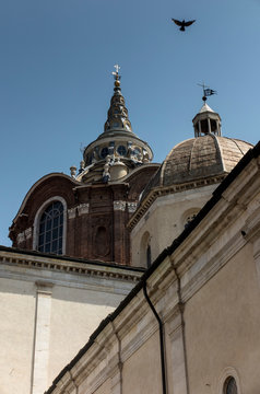 Duomo di Torino San Giovanni Battista catholic cathedral where the Holy Shroud of Turin is rested with bell tower and Sacra Sindone chapel on square in historical centre of Turin