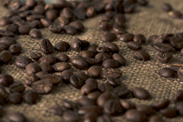 Roasted coffee beans on a sack