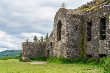 Fototapeta na wymiar The ruins of the iconic HellFire Club on Montpelier Hill in Dublin, Ireland, a very popular site for Irish walkers, a place of mystery and horror stories, on a summer day, side view.