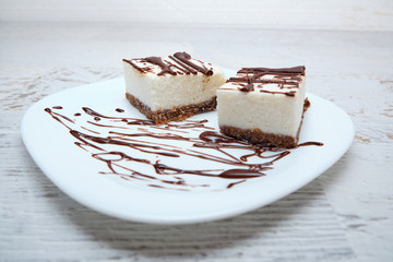 Coconut cake with chocolate on top