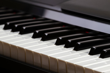 Naklejka premium Close up of piano keyboard keys