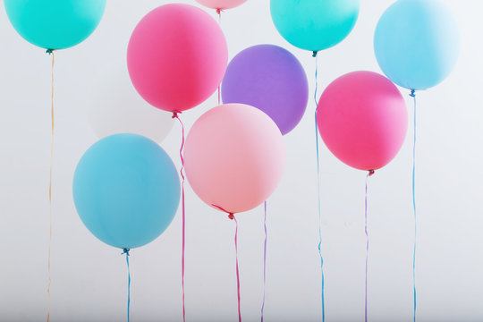 balloons on white wooden background