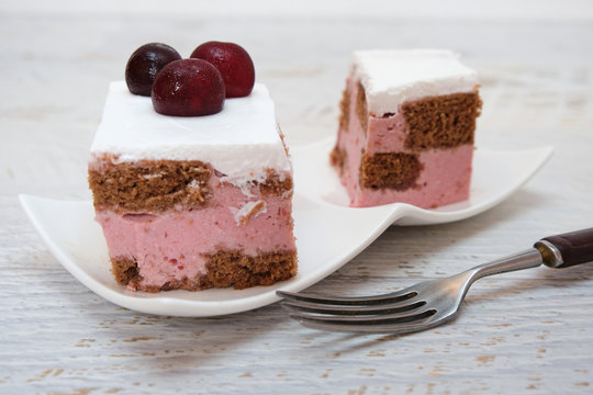 Cherry yogurt cake decorated with fresh fruits