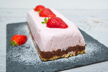 Chocolate strawberry yogurt cake decorated with fresh fruits