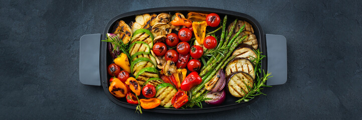 Seasonal summer grilled vegetables in a pan © aamulya