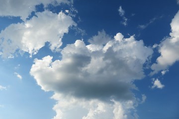 Naklejka na ściany i meble Beautiful sky view with fluffy clouds