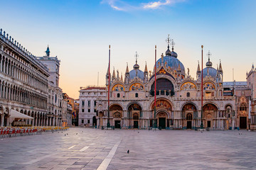 Sunrise in San Marco square with Campanile and San Marco's Basilica. The main square of the old town. Venice, Veneto Italy. - obrazy, fototapety, plakaty