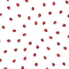 Scattered Pomegranate Seeds Isolated on White Background
