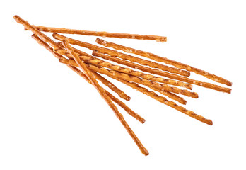 Bread sticks straws with salt on a white background. Salty snacks.