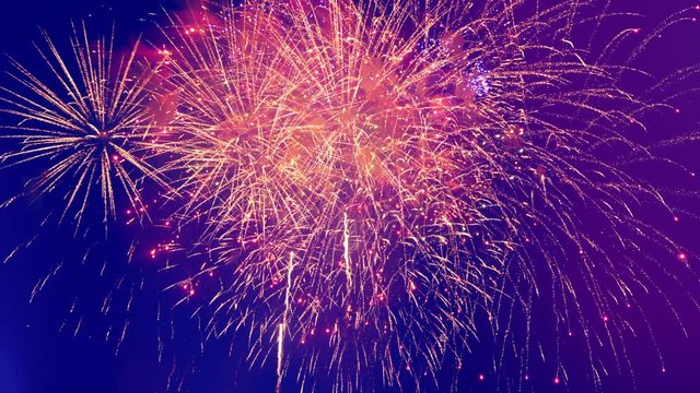 Large-scale fireworks' gleams at night