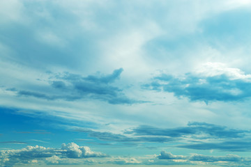 Puffy Clouds on a Blue Evening Sky