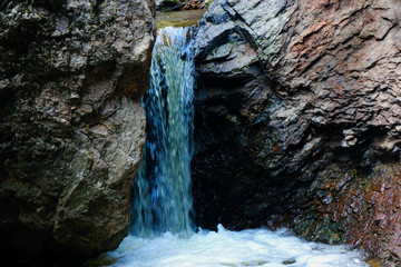 Small Waterfall Formed by Boulders