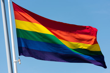Rainbow flag waving in the breeze.