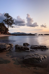 Fototapeta na wymiar Rock formations at beach in tip of Borneo