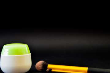 A bottle of household chemicals cosmetics on a black background neck of a bottle close up macro...