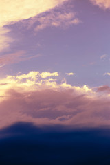 dark blue clouds at pink sunset