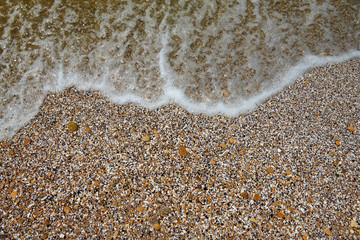sea beach, wave and sand - beautiful summer landscape and travel concept, bright day, top view