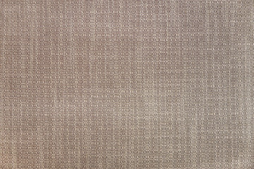Obraz na płótnie Canvas abstract background of light brown fabric for furniture upholstery close up