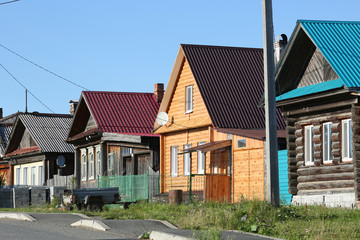 Village street in summer. Village of Visim, Sverdlovsk region, Russia.
