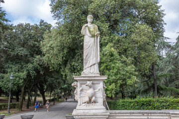 Art sculpture in green garden of Villa Borghese