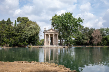 Fototapeta na wymiar Panoramic view of Temple of Asclepius (Tempio di Esculapio) and lake