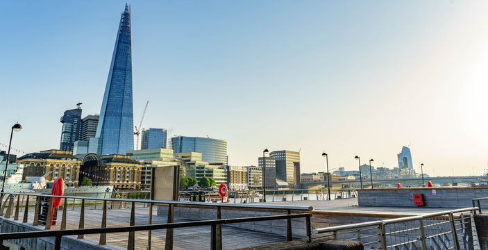 London skyline at sunny day including the shard. Picture took along the riverside.