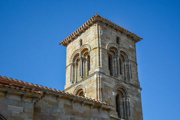 Fototapeta na wymiar Beautiful tower of the church of Santa Cecilia in Aguilar de Campoo, Palencia, Spain.