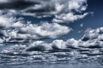 Beautiful clouds with blue sky background. Nature weather, dramatic storm clouds