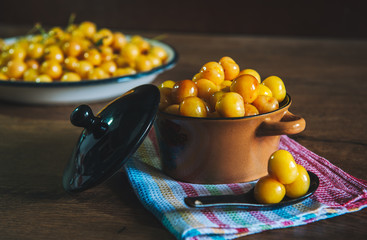 Fresh natural Yellow Cherry fruits on plate