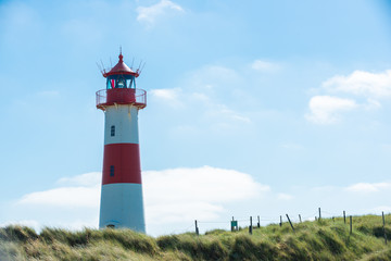 Lighthouse red white on dune. Sylt island – North Germany.