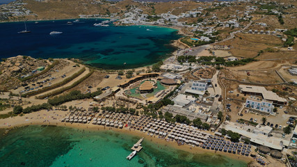 Aerial drone bird's eye view from famous beach of Paraga and Agia Anna featuring iconic Skorpios...