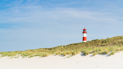  Lighthouse red white on dune. Sylt island – North Germany.  