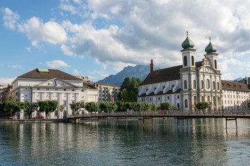 Fototapeta premium Panoramic view of Lucerne city with Jesuit Church and river Reuss