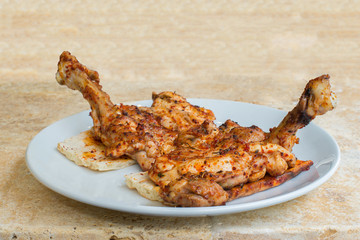 grilled chicken kebab on a plate