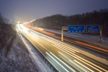 Obraz na płótnie Canvas Freeway at night driving fast