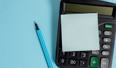 Electronic calculator device blank sticky note marker colored background