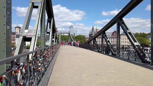 View from Eiserner Steg / The Iron Bridge on Main River to the business centre of the city, July 2019