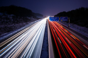 Freeway at night blurry lightbeams